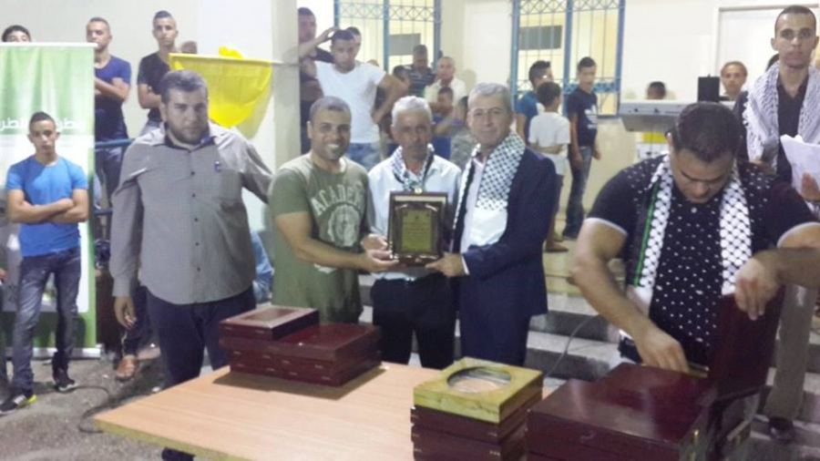 قوات الأمن الوطني الفلسطيني تشارك في حفل تكريم الطلبة الناجحين في الثانوية العامة في مخيم جنين